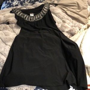 XL. Black beads (some loose) knee length.stretchy. JFW brand.(china)